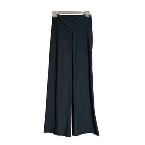 Nike black boot cut work out pants.